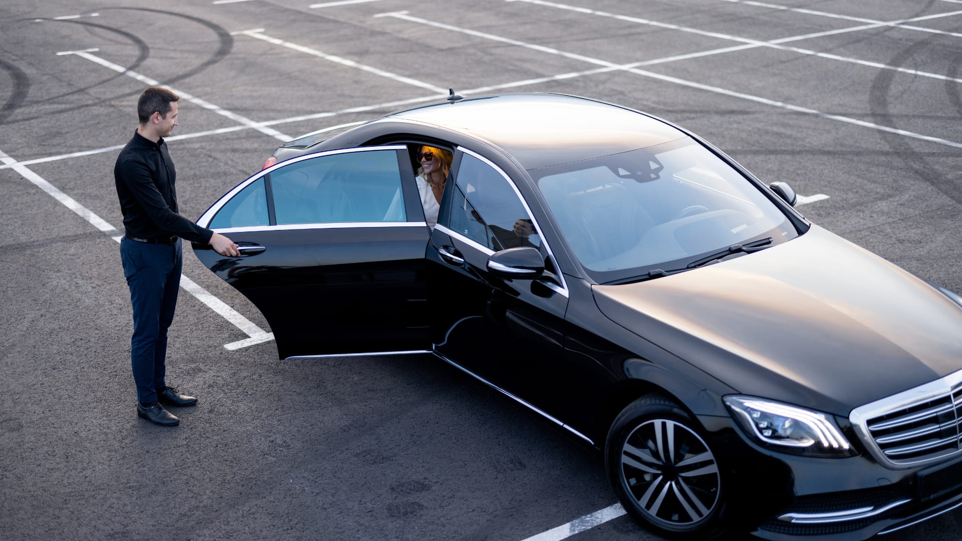 Private chauffeur waiting for guests during a wine tour from Lyon